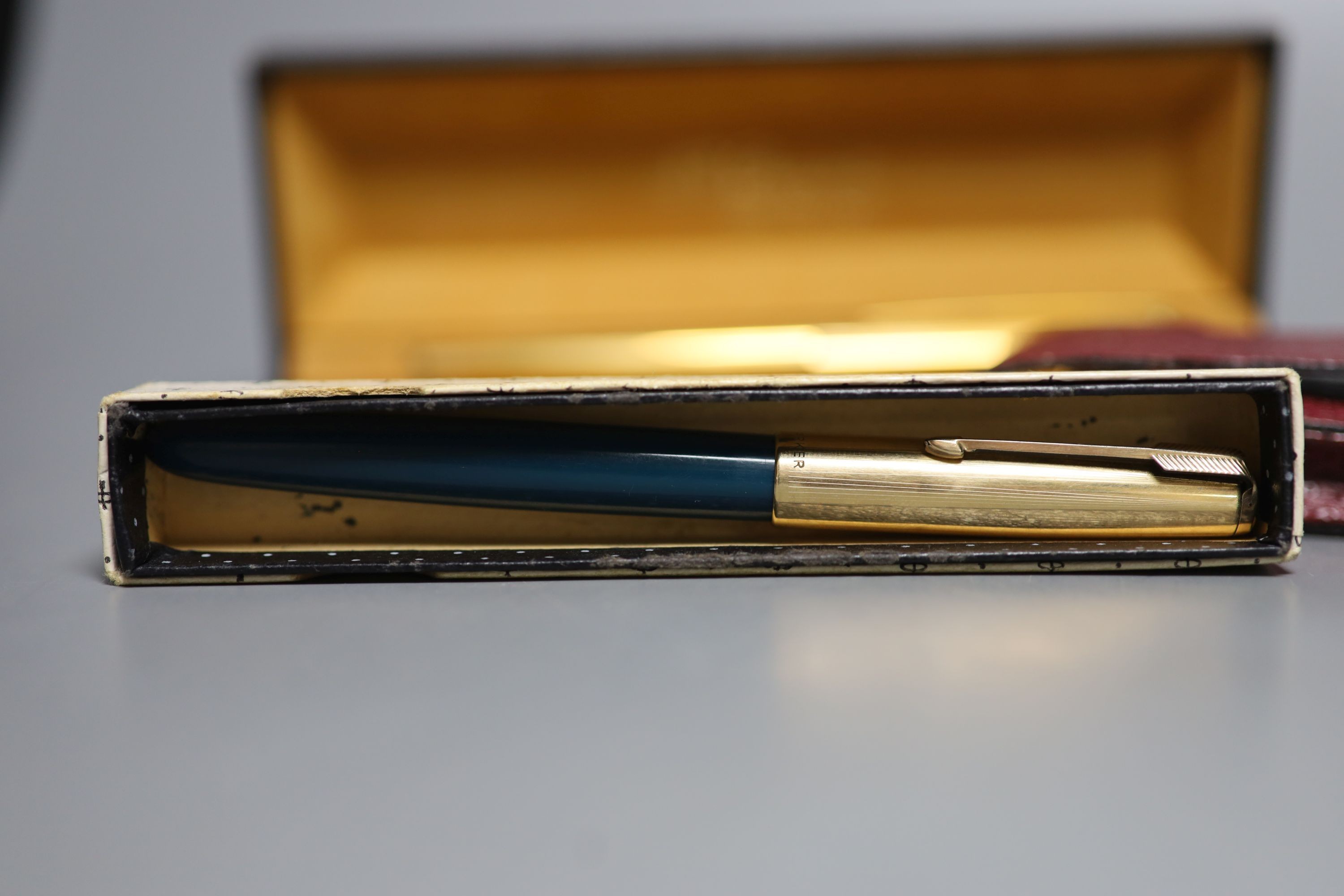 A Parker pen trio, boxed Parker fountain pen, other pens and pencils